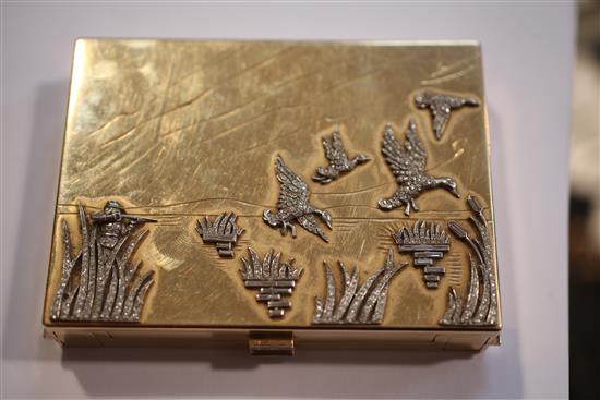 A ladys 1940s/1950s American? 14ct gold and diamond set minaudiere, 10.5cm.